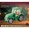 Lumineo Batterie LED Weihnachtsmann im grünen Trecker Beleuchtung Bewegung & Musik 22 x 17 cm - warmweiß
